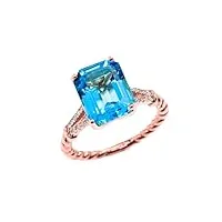 bague de fiançailles pour femme en or rose 9 carat avec topaze bleue et diamant en forme de corde solitaire en taille émeraude