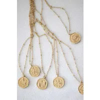 collier doré petite médaille signe du zodiaque bélier