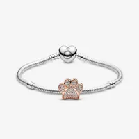 bracelet composé charm empreinte de patte scintillante or rose