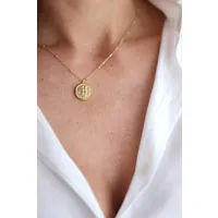 collier doré petite médaille signe du zodiaque gémeaux