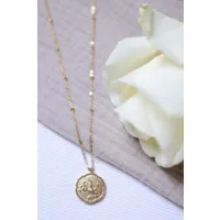 collier doré petite médaille signe du zodiaque capricorne